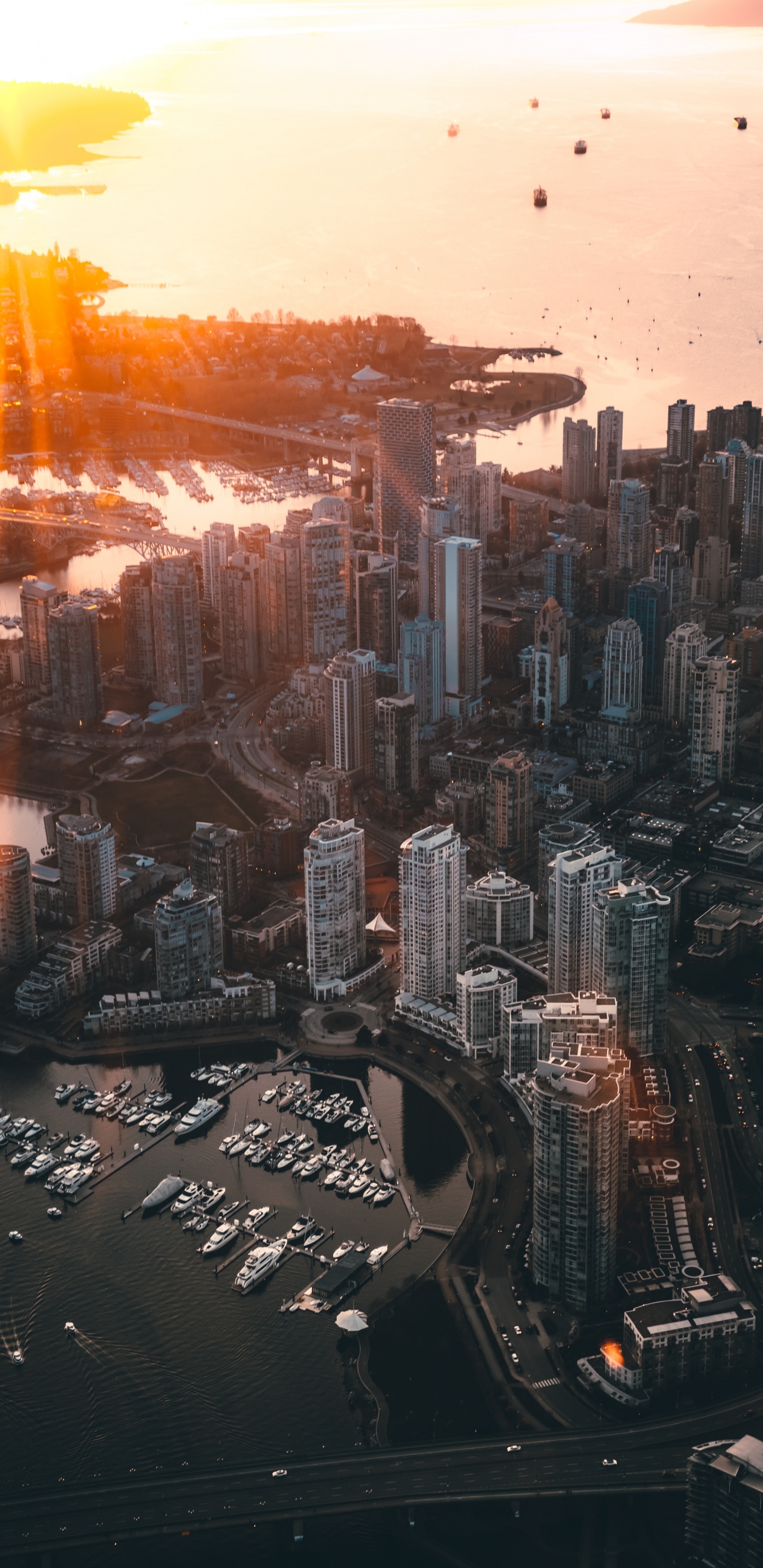 Aerial View of City Buildings During Sunset. Wallpaper in 1440x2960 Resolution