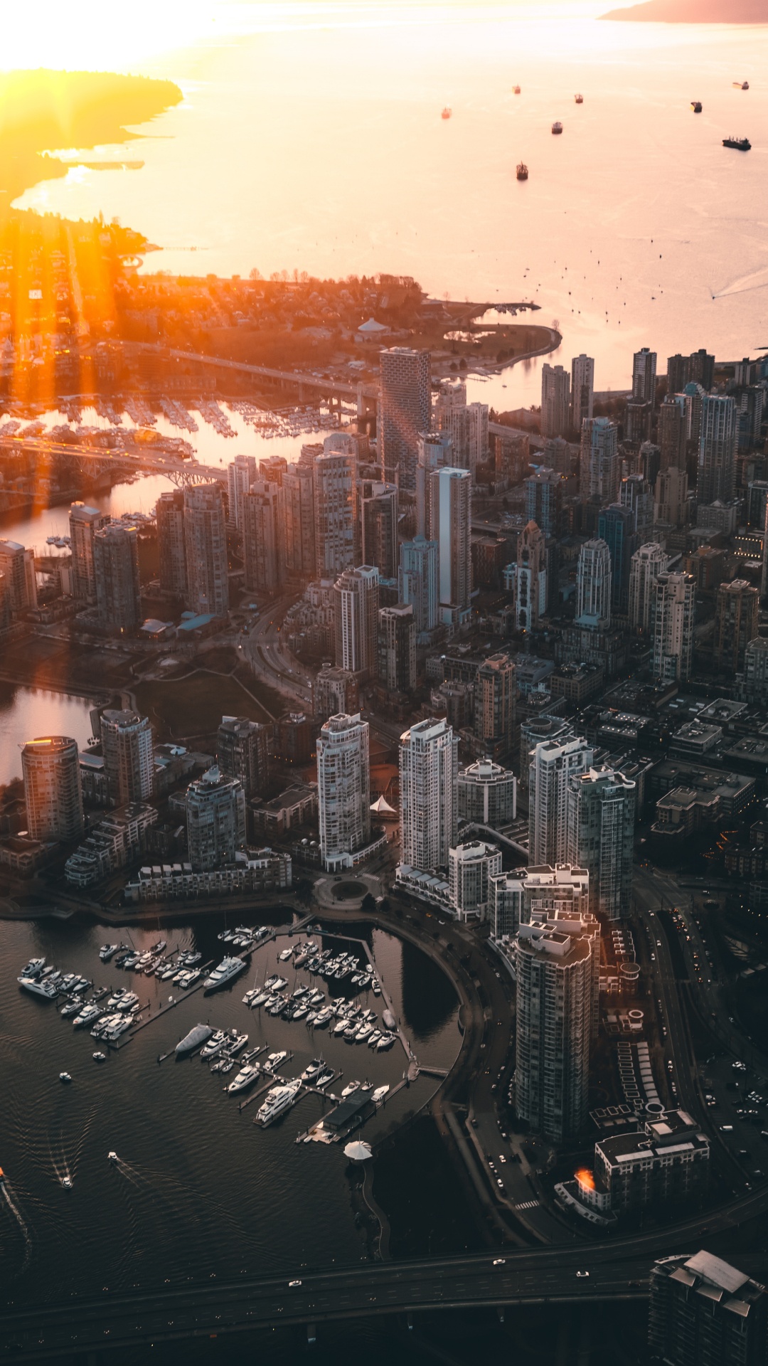 Vue Aérienne Des Bâtiments de la Ville au Coucher du Soleil. Wallpaper in 1080x1920 Resolution