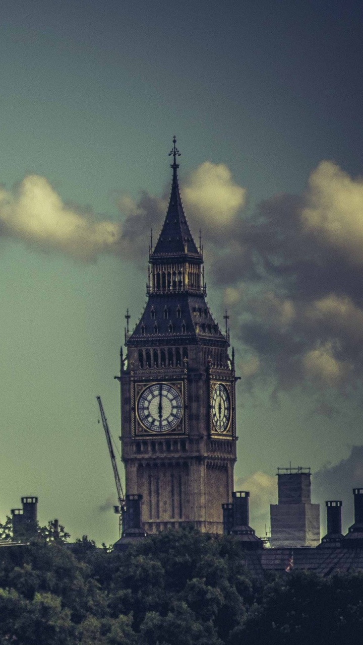 Braunes Betongebäude Tagsüber. Wallpaper in 720x1280 Resolution