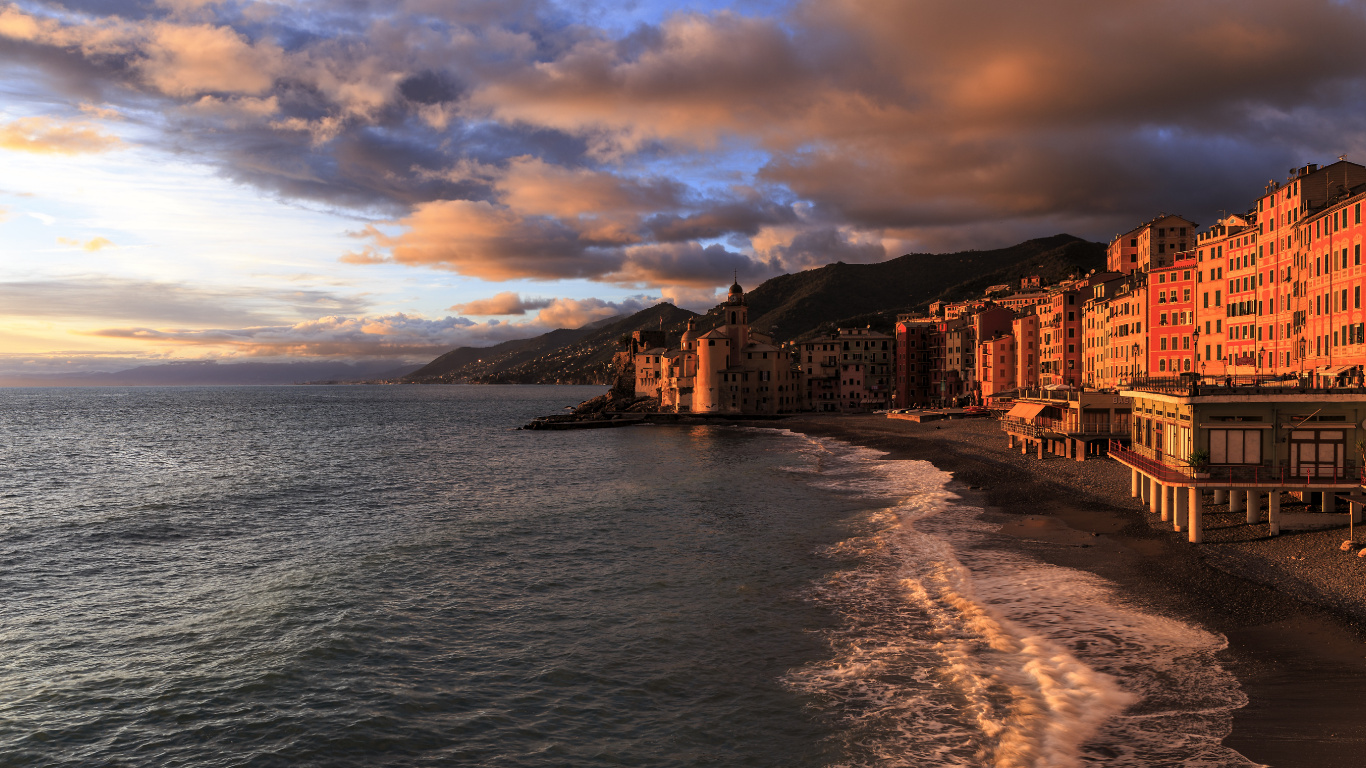 Brown Concrete Building Near Body of Water Under Cloudy Sky During Daytime. Wallpaper in 1366x768 Resolution