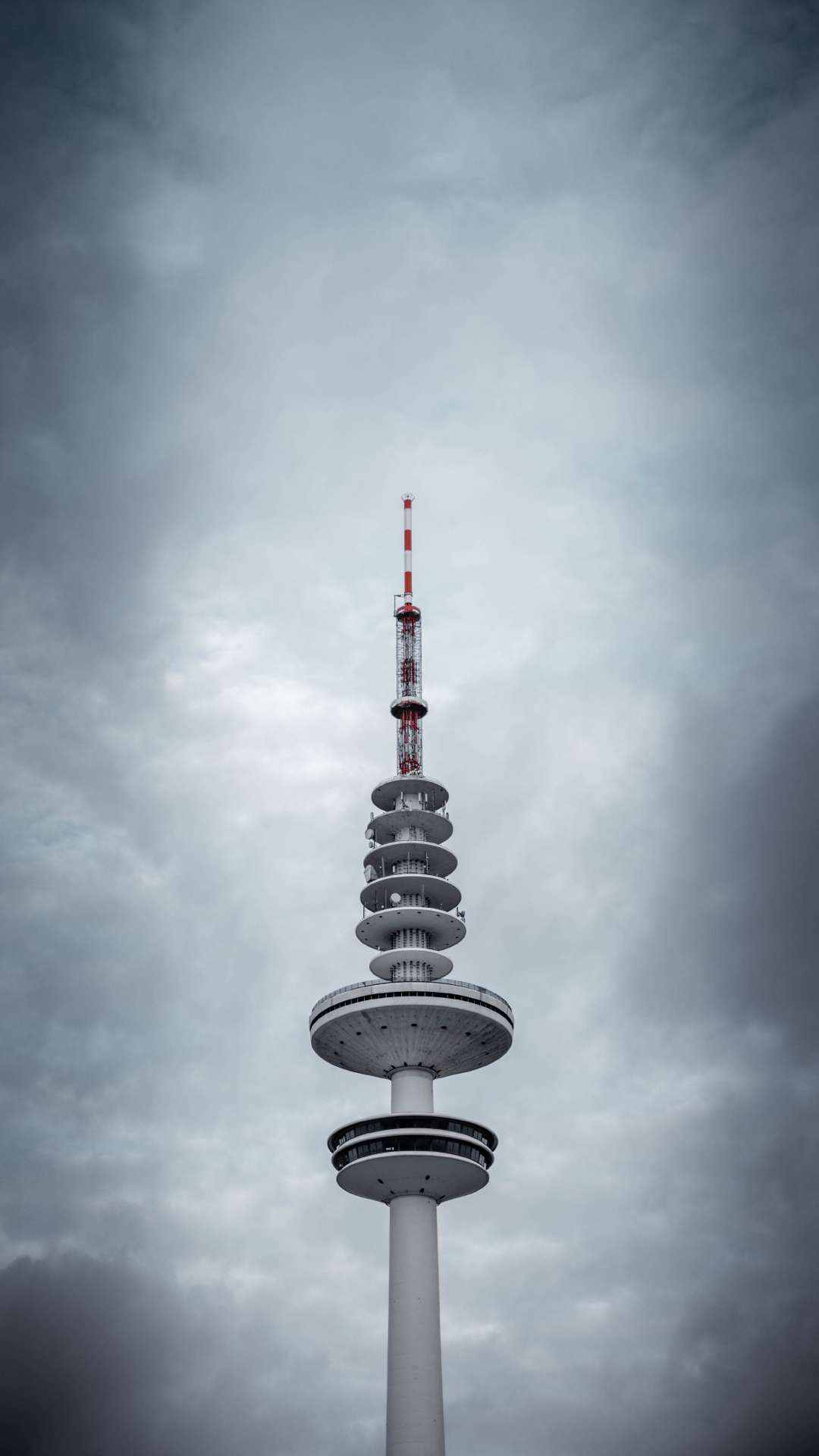 White and Black Tower Under Cloudy Sky. Wallpaper in 1080x1920 Resolution