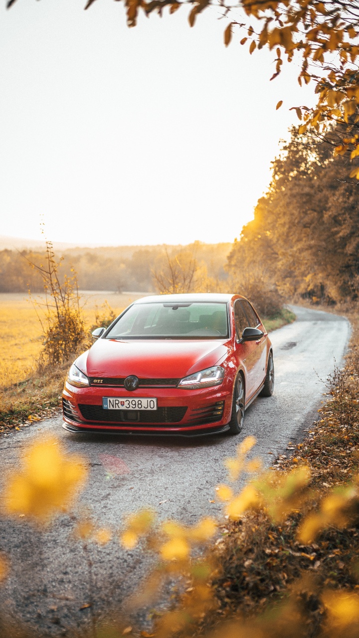 Red Car on Road During Daytime. Wallpaper in 720x1280 Resolution