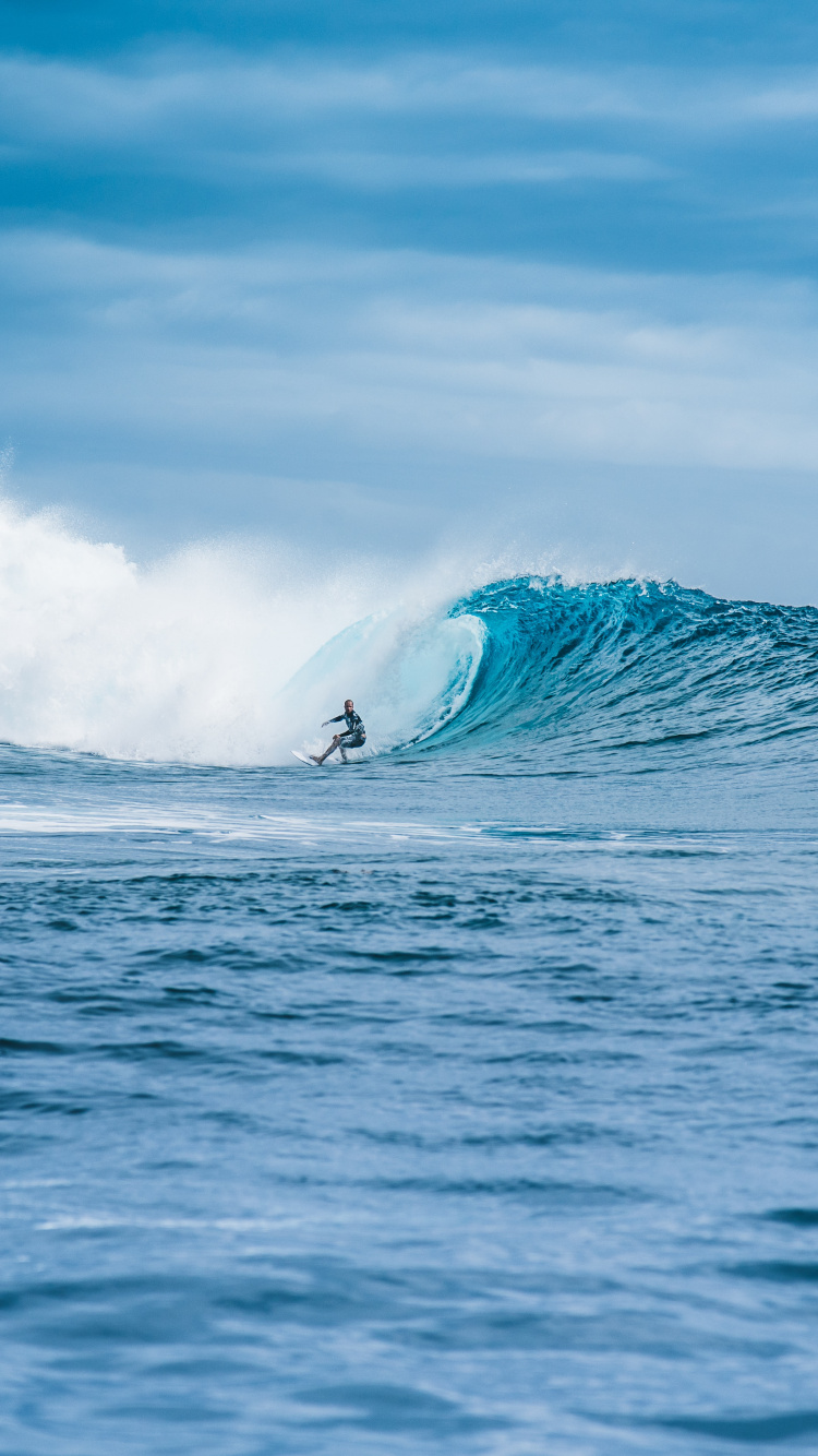 Person Surfing on Sea Waves During Daytime. Wallpaper in 750x1334 Resolution