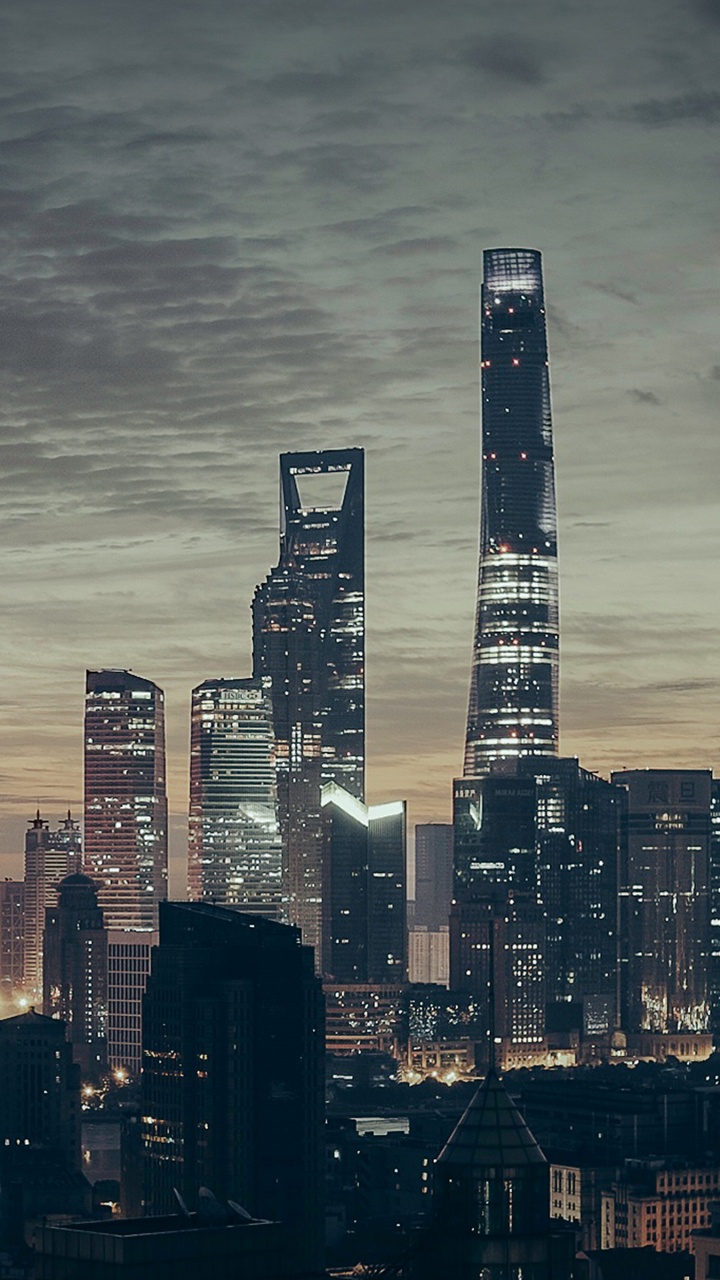 City Skyline During Night Time. Wallpaper in 720x1280 Resolution