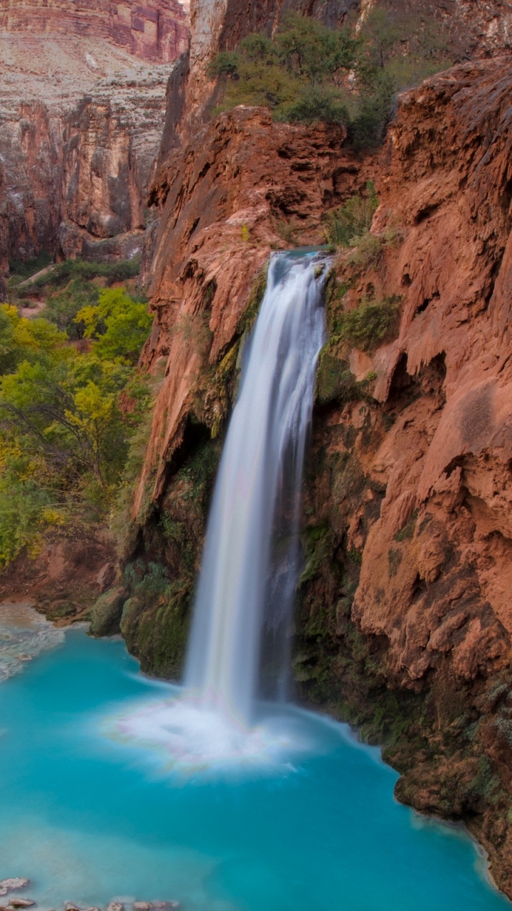 Water Falls on Brown Rocky Mountain. Wallpaper in 720x1280 Resolution
