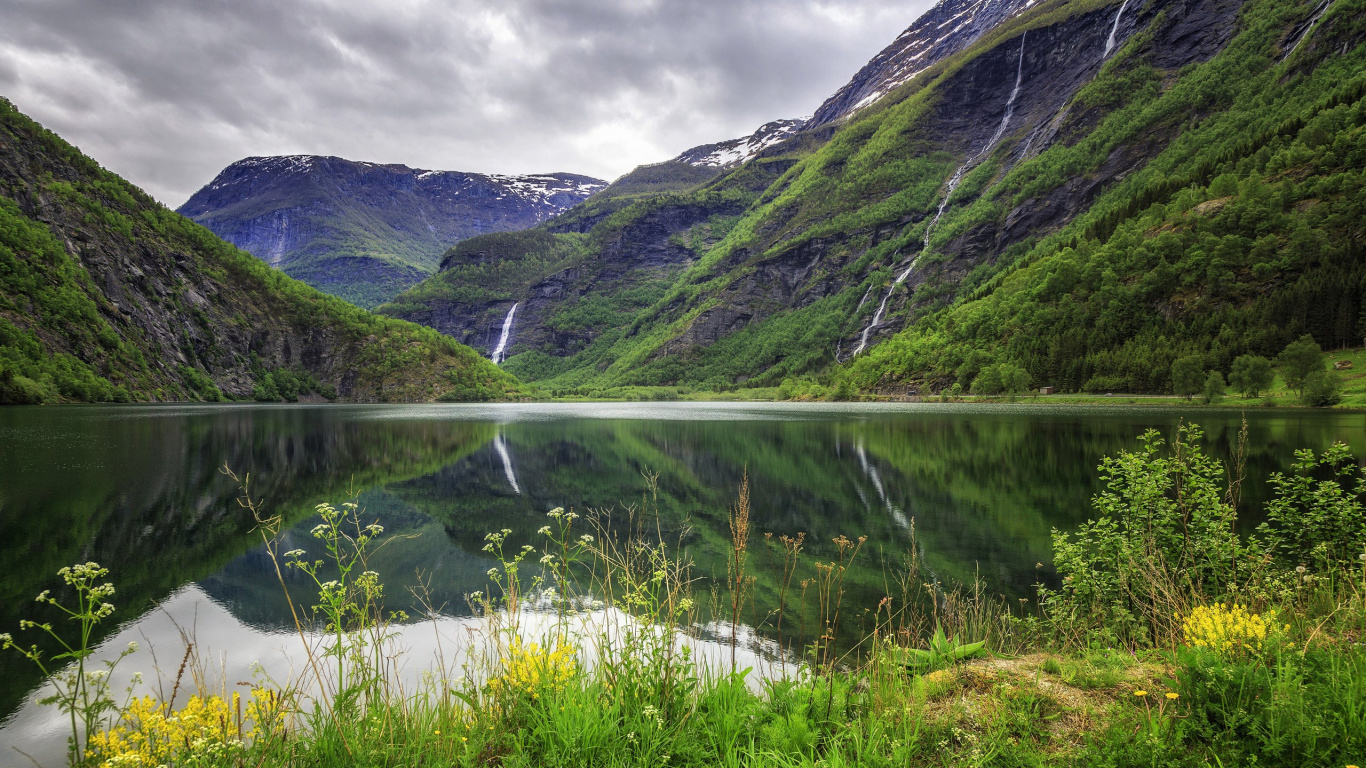 Green and Gray Mountains Under White Cloudy Sky During Daytime. Wallpaper in 1366x768 Resolution