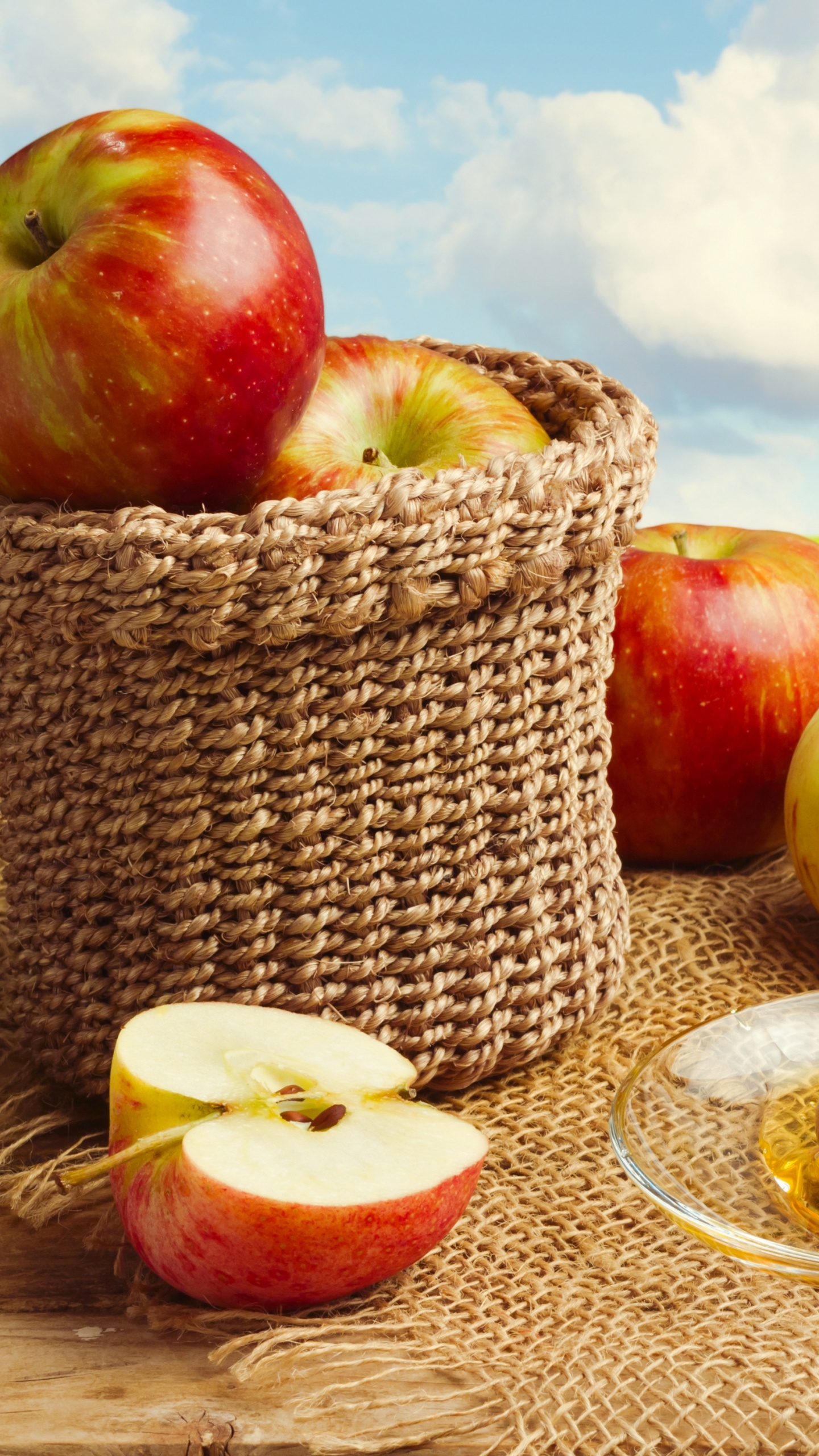 Red Apples on Brown Woven Basket. Wallpaper in 1440x2560 Resolution
