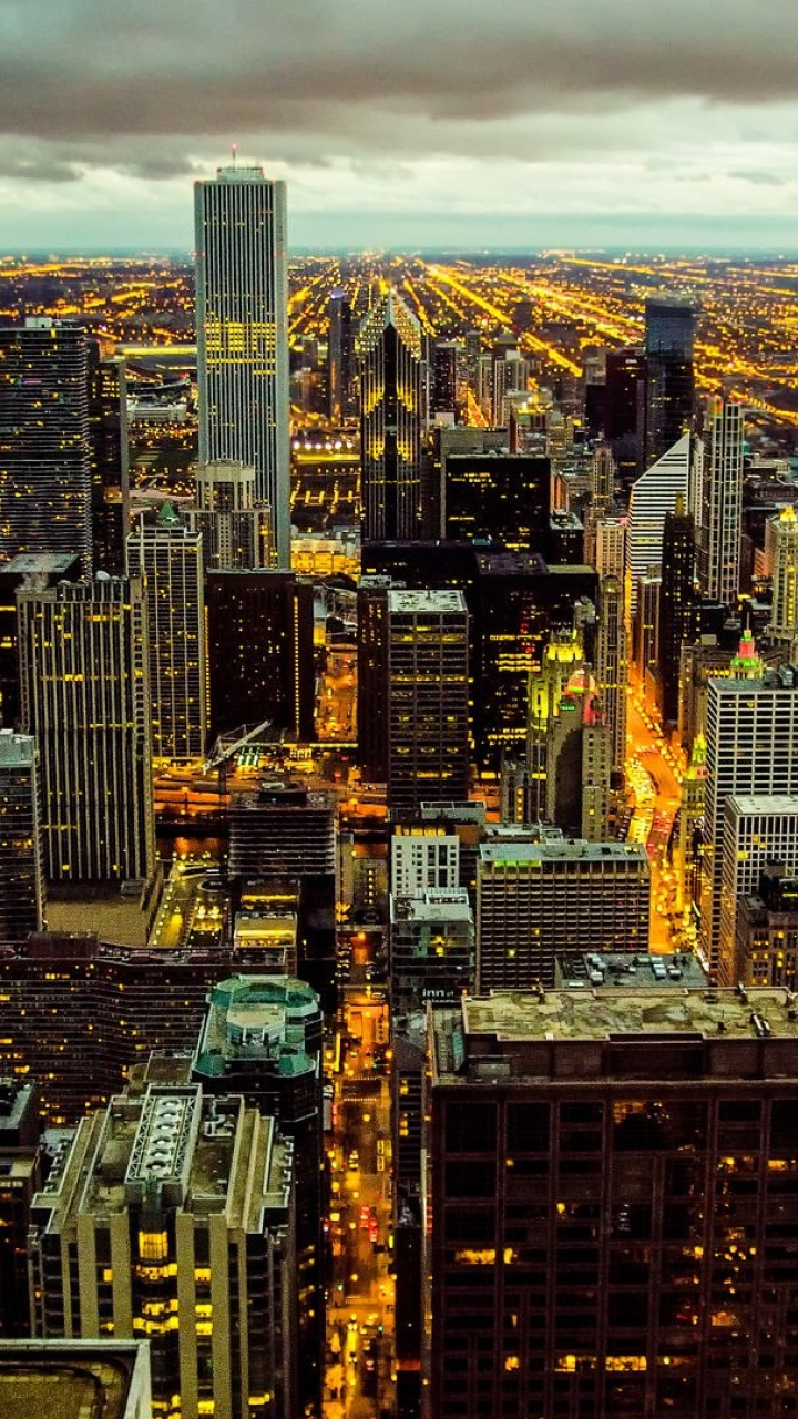 Aerial View of City Buildings During Night Time. Wallpaper in 720x1280 Resolution