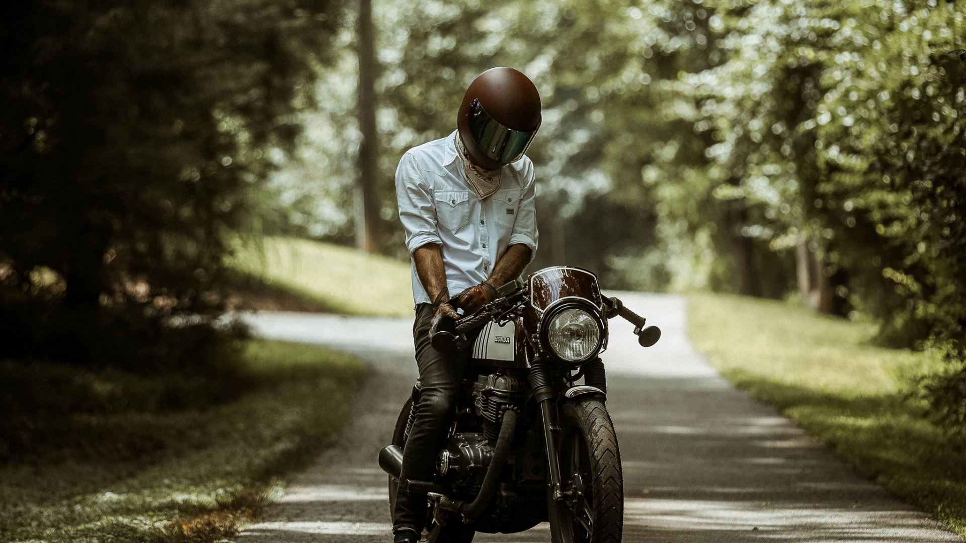 Man in White Shirt Riding Motorcycle on Road During Daytime. Wallpaper in 1920x1080 Resolution
