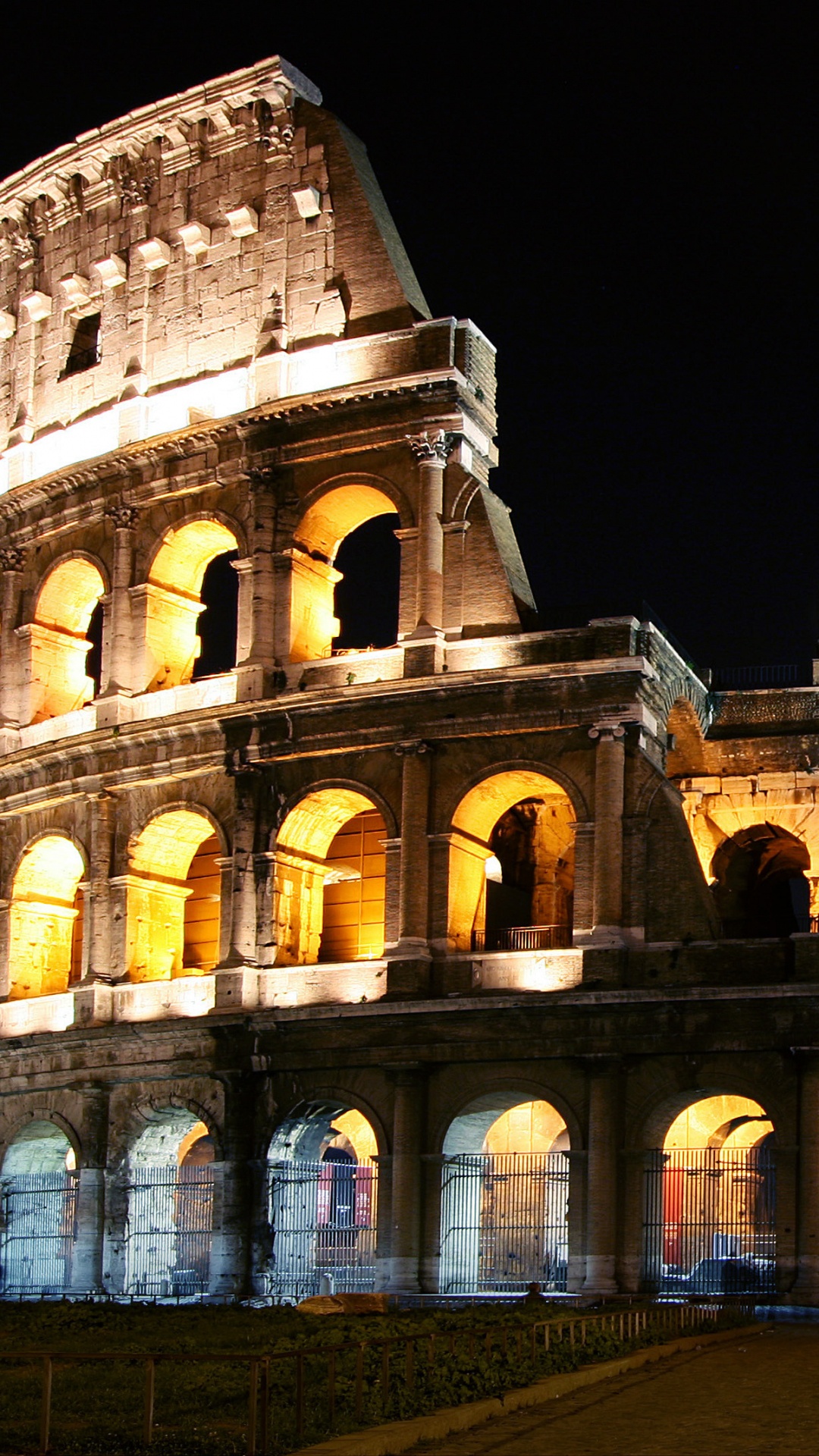 Edificio de Hormigón Marrón Durante la Noche. Wallpaper in 1080x1920 Resolution