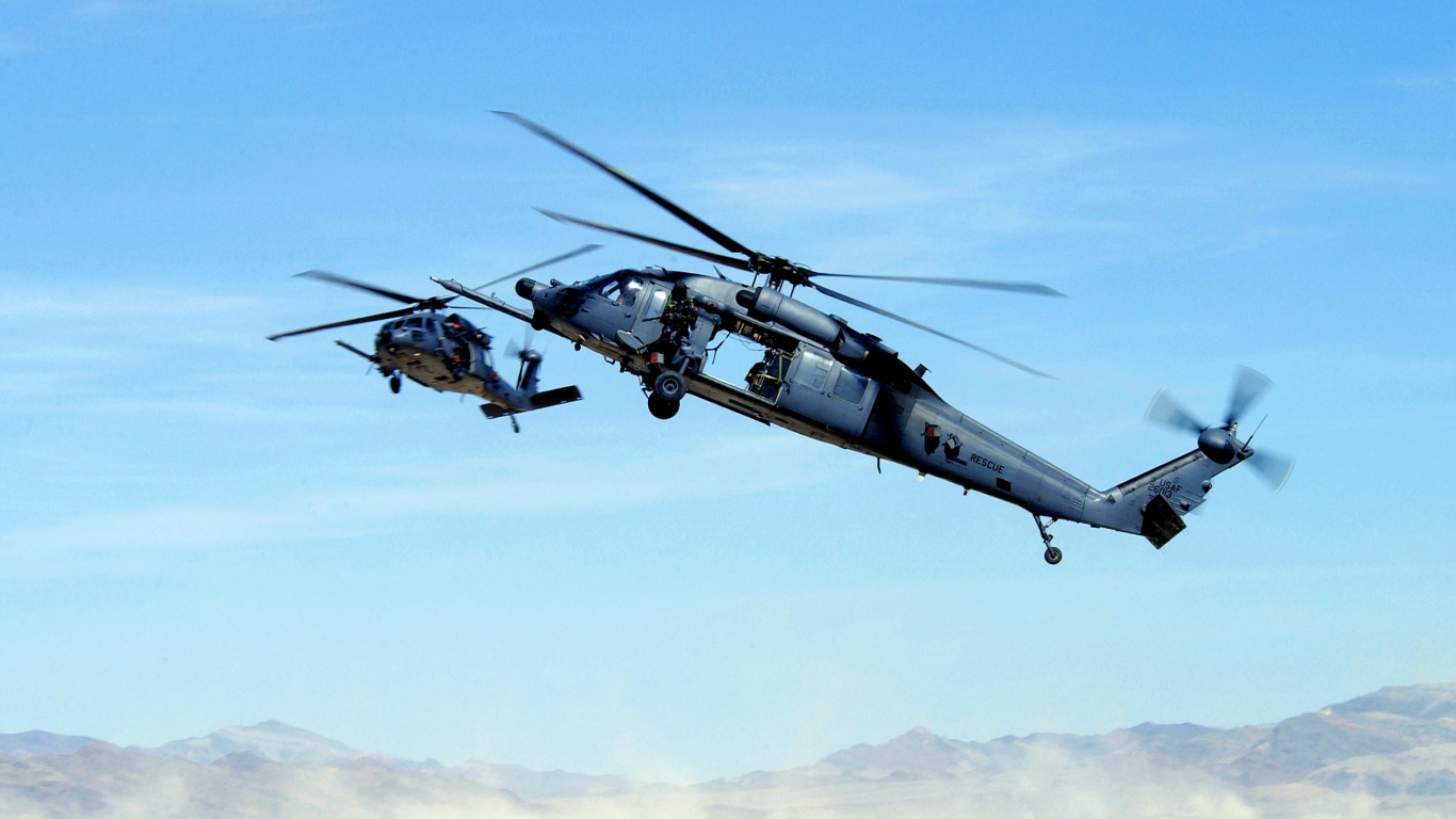 Black and Gray Helicopter Flying in The Sky During Daytime. Wallpaper in 1366x768 Resolution