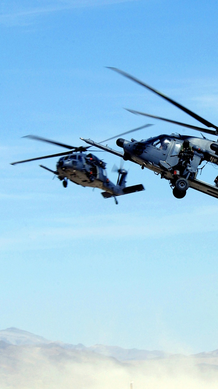 Black and Gray Helicopter Flying in The Sky During Daytime. Wallpaper in 720x1280 Resolution