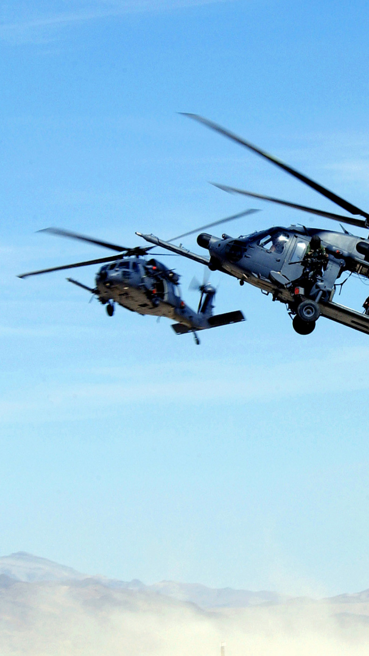 Black and Gray Helicopter Flying in The Sky During Daytime. Wallpaper in 750x1334 Resolution