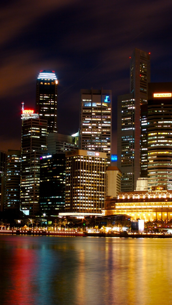 City Skyline During Night Time. Wallpaper in 720x1280 Resolution