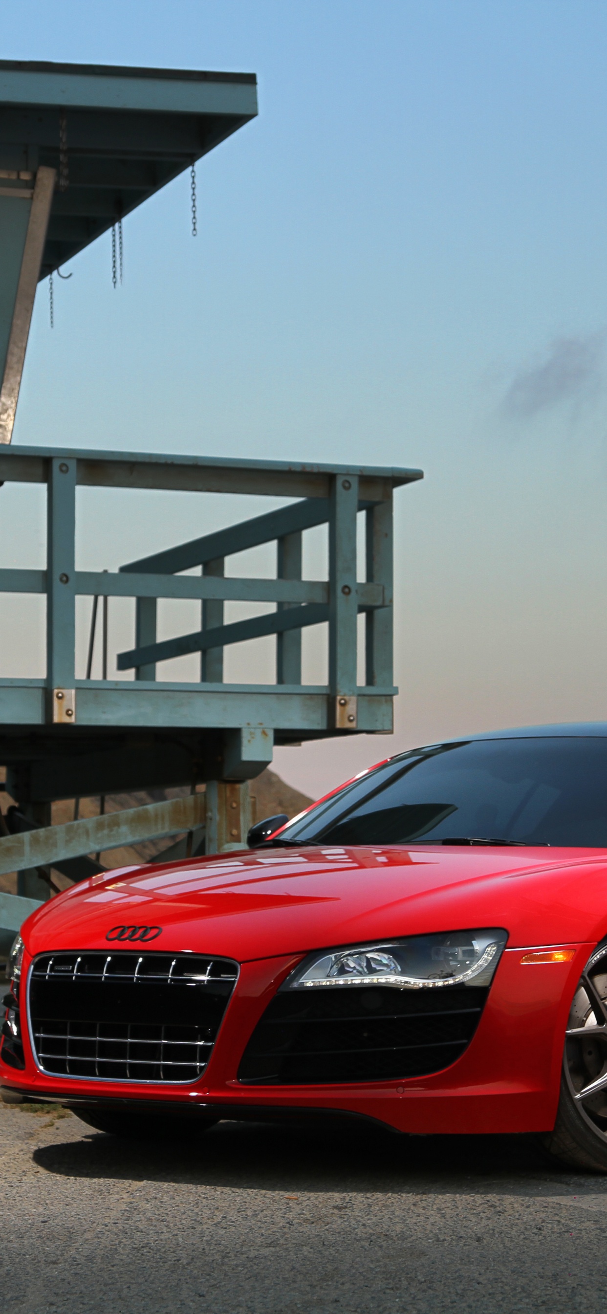 Red Bmw m 3 Parked Near Gray Building. Wallpaper in 1242x2688 Resolution