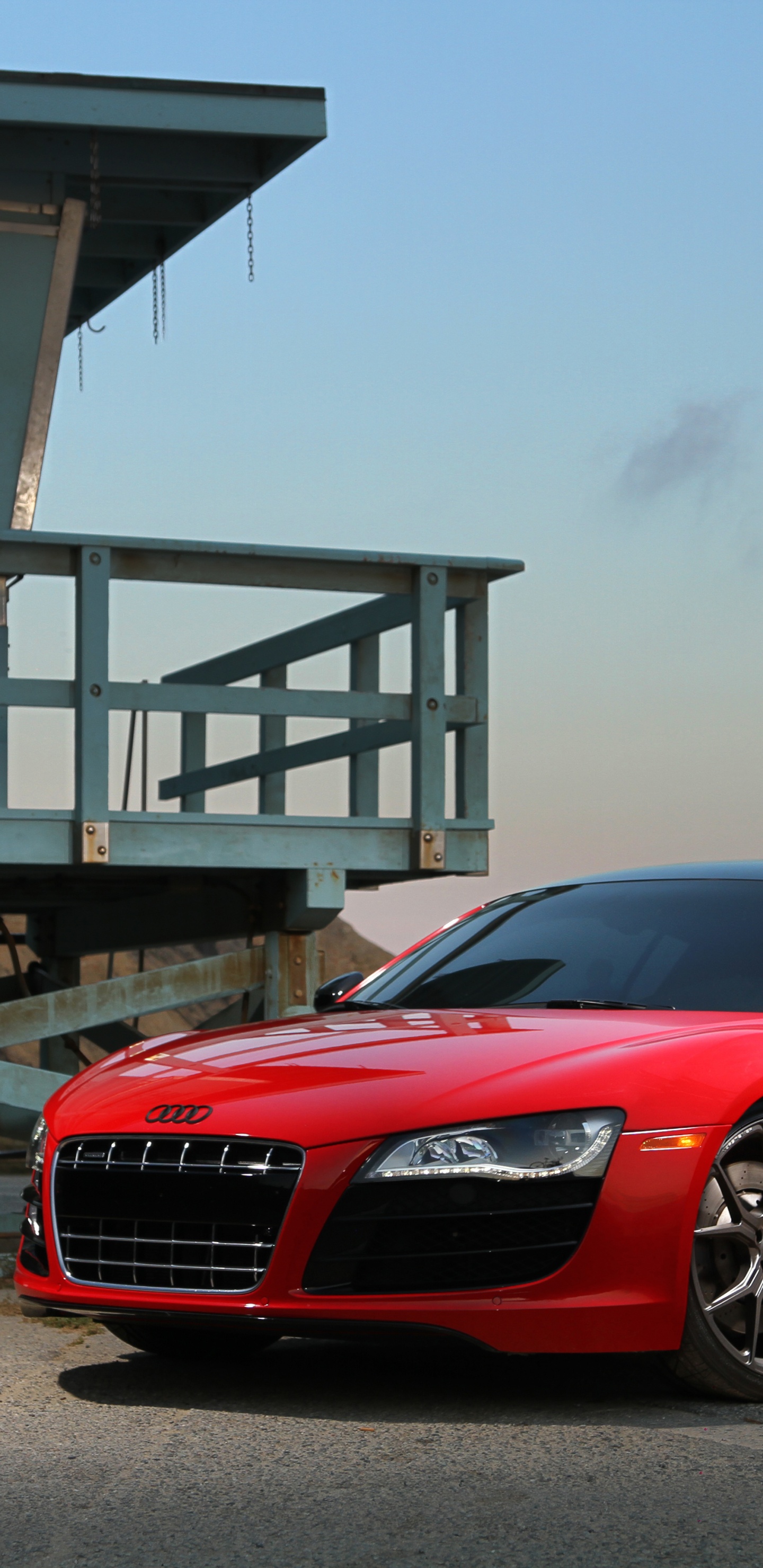 Red Bmw m 3 Parked Near Gray Building. Wallpaper in 1440x2960 Resolution