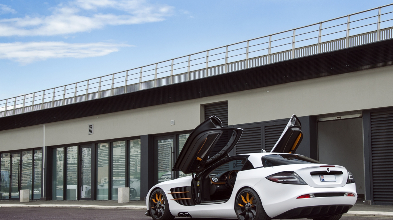 White and Black Porsche 911 Parked on Parking Lot. Wallpaper in 1366x768 Resolution