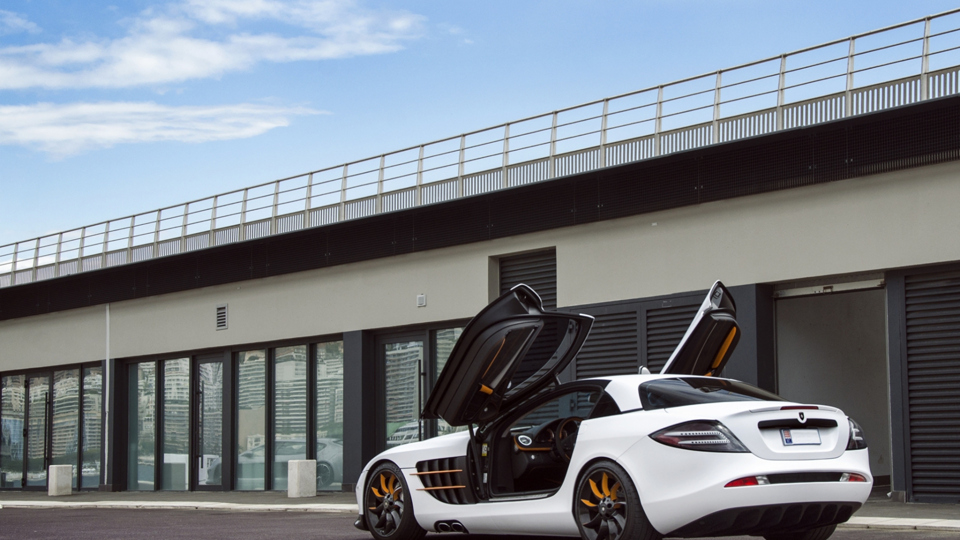 White and Black Porsche 911 Parked on Parking Lot. Wallpaper in 1920x1080 Resolution