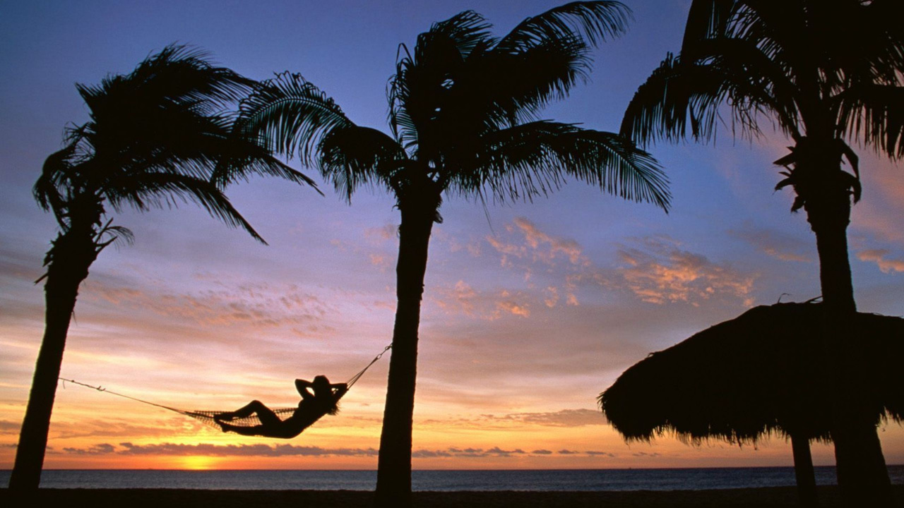 Silhouette of Woman Sitting on Hammock Near Beach During Sunset. Wallpaper in 1280x720 Resolution