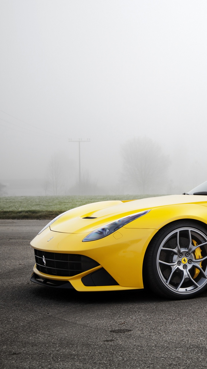 Gelber Ferrari 458 Italia Coupé. Wallpaper in 720x1280 Resolution