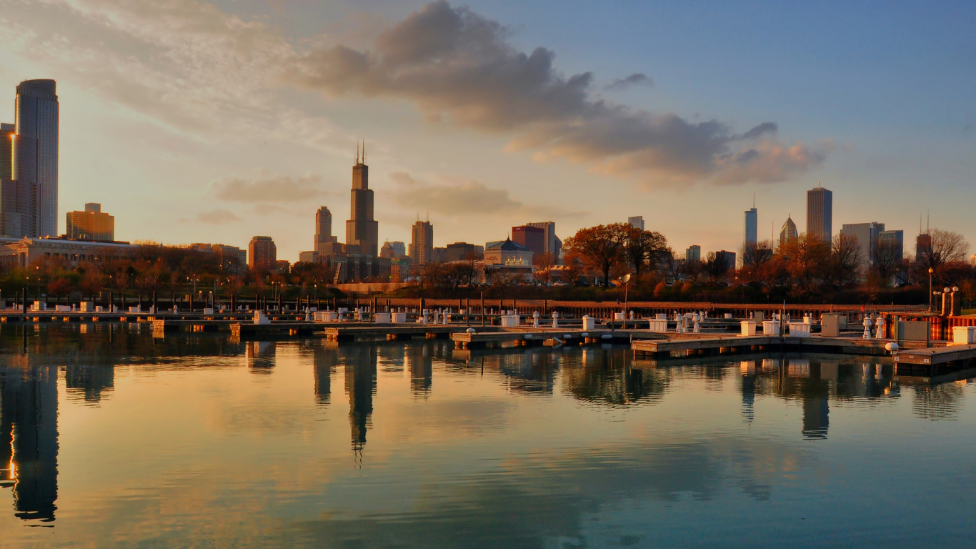 City Skyline Across Body of Water During Night Time. Wallpaper in 1366x768 Resolution
