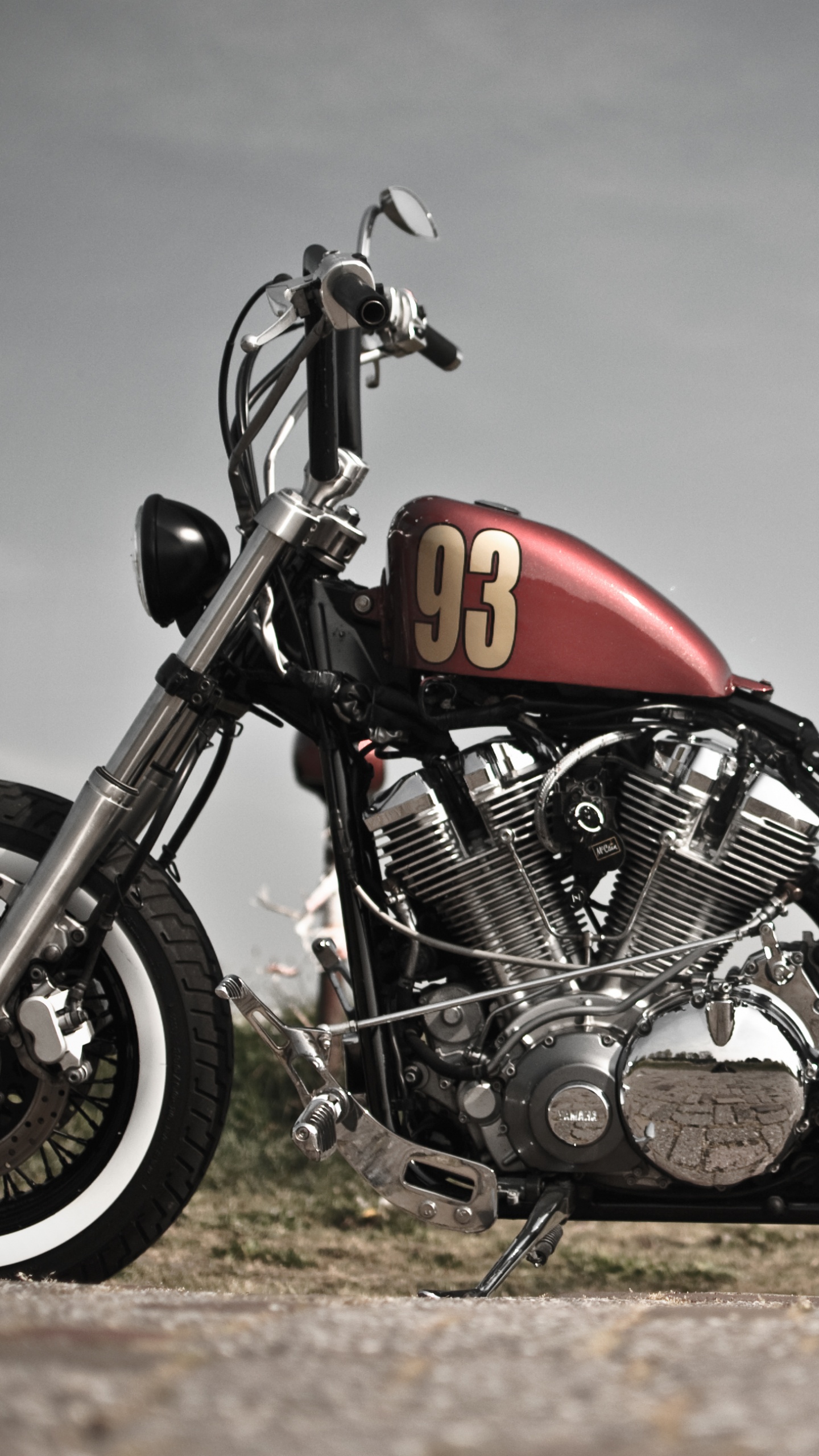 Red and Black Motorcycle on Brown Field. Wallpaper in 1440x2560 Resolution