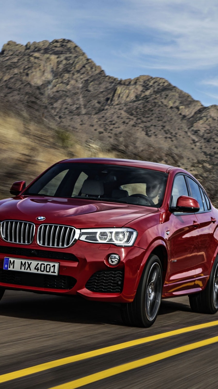 Roter Audi r 8 Tagsüber Unterwegs. Wallpaper in 720x1280 Resolution