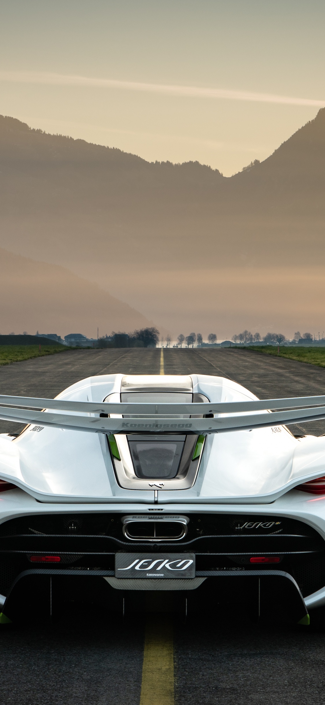 White Porsche 911 on Road During Daytime. Wallpaper in 1125x2436 Resolution