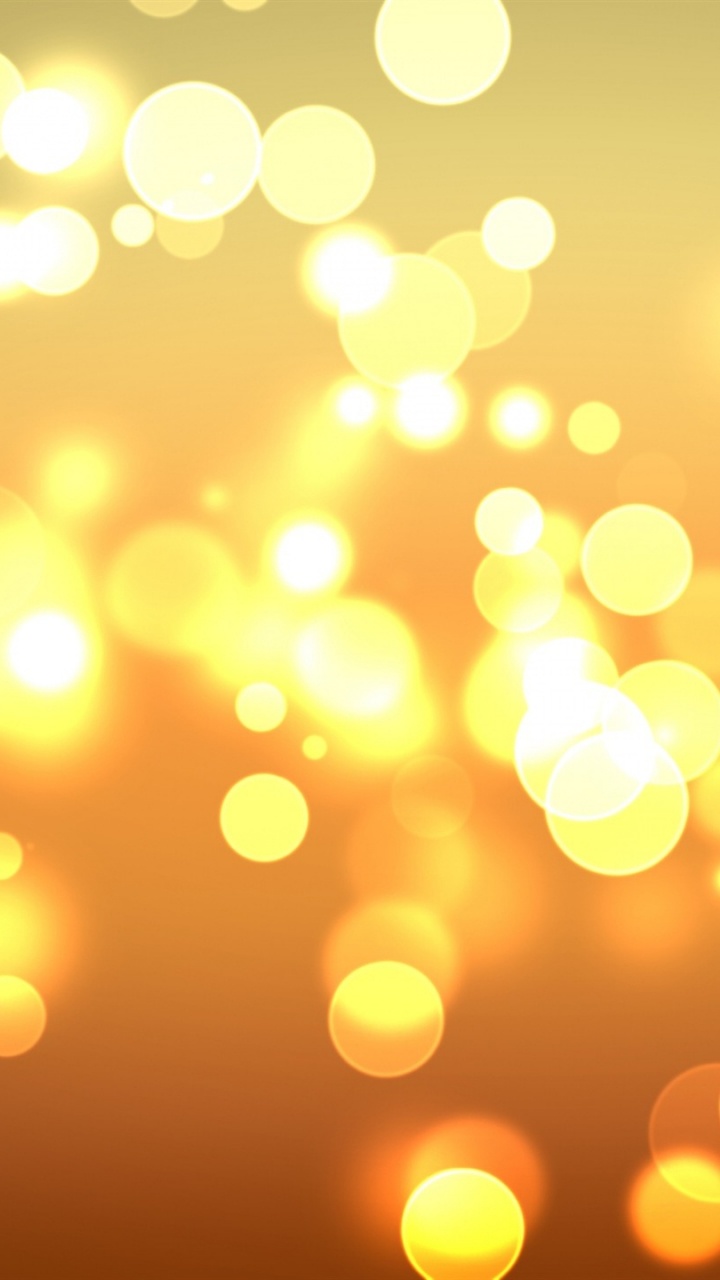 Lumières Bokeh Orange et Jaune. Wallpaper in 720x1280 Resolution