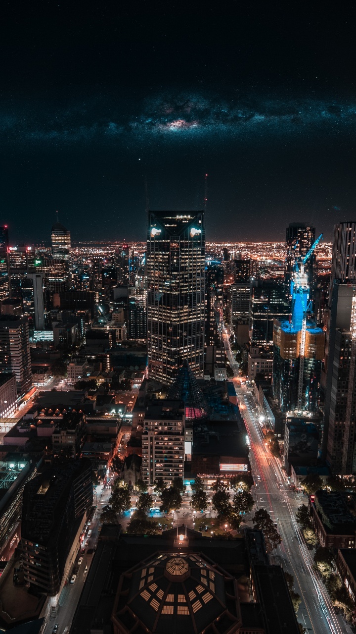 Aerial View of City Buildings During Night Time. Wallpaper in 720x1280 Resolution