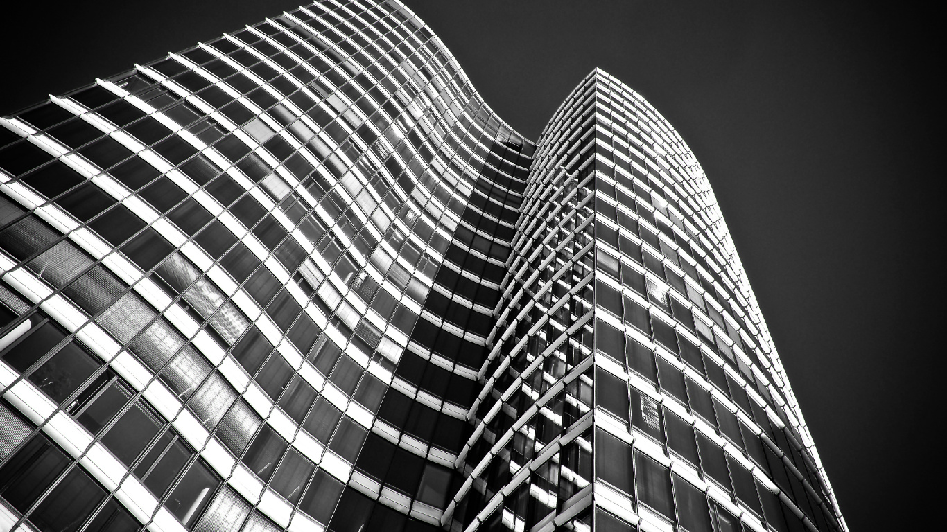 Grayscale Photo of High Rise Building. Wallpaper in 1366x768 Resolution