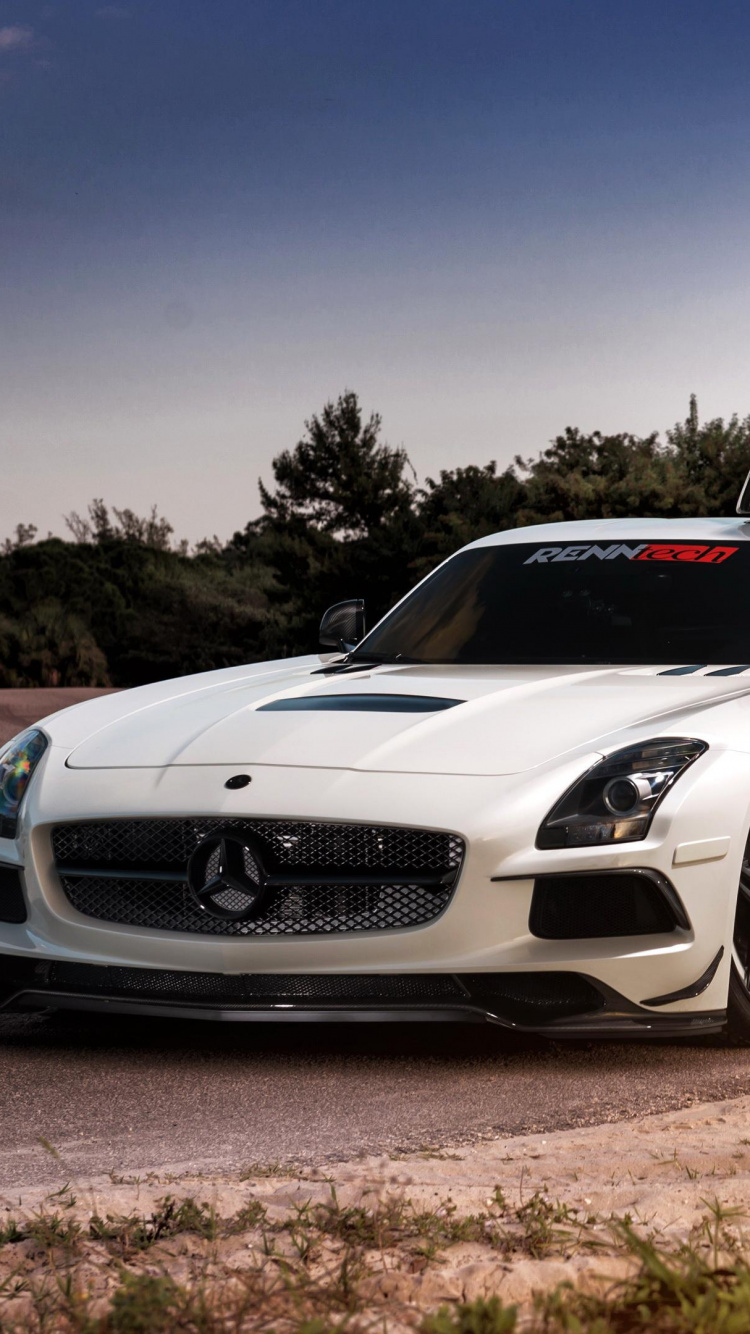 White Porsche 911 on Brown Field Under Blue Sky During Daytime. Wallpaper in 750x1334 Resolution