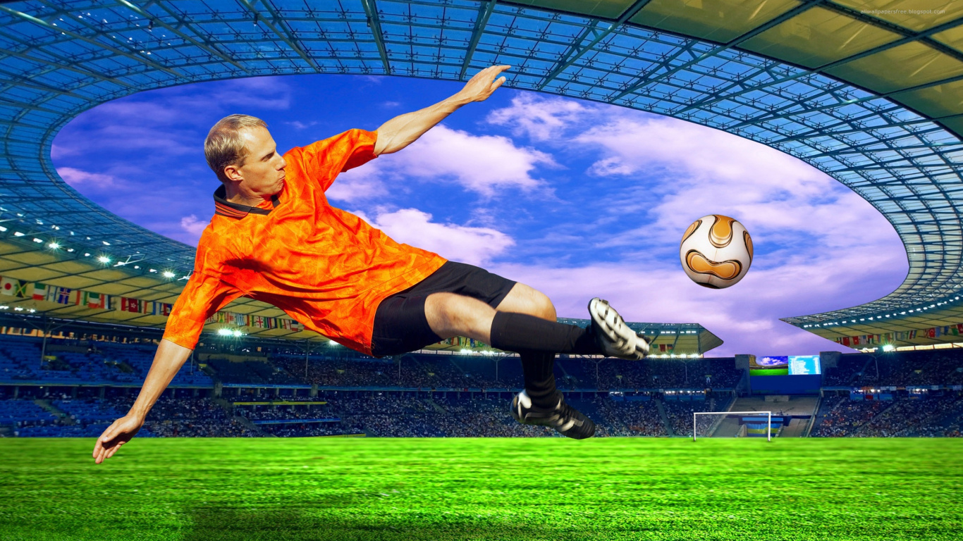 Hombre Con Camiseta Naranja de Fútbol Nike y Pantalones Cortos Negros Jugando al Fútbol. Wallpaper in 1366x768 Resolution
