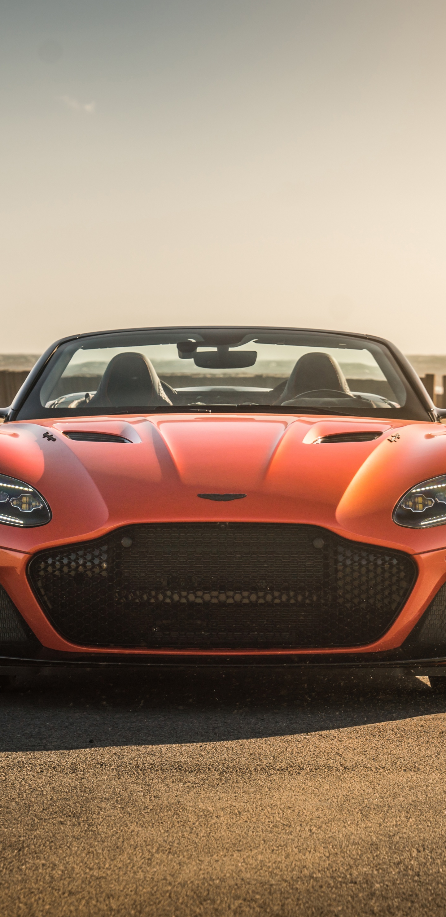 Orange Porsche 911 on Brown Dirt Road During Daytime. Wallpaper in 1440x2960 Resolution