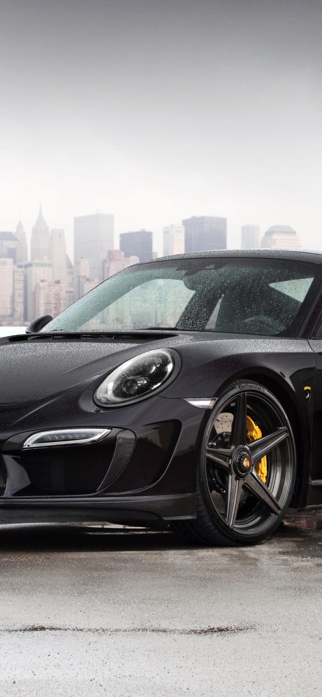 Black Porsche 911 Parked on Gray Pavement During Daytime. Wallpaper in 1125x2436 Resolution