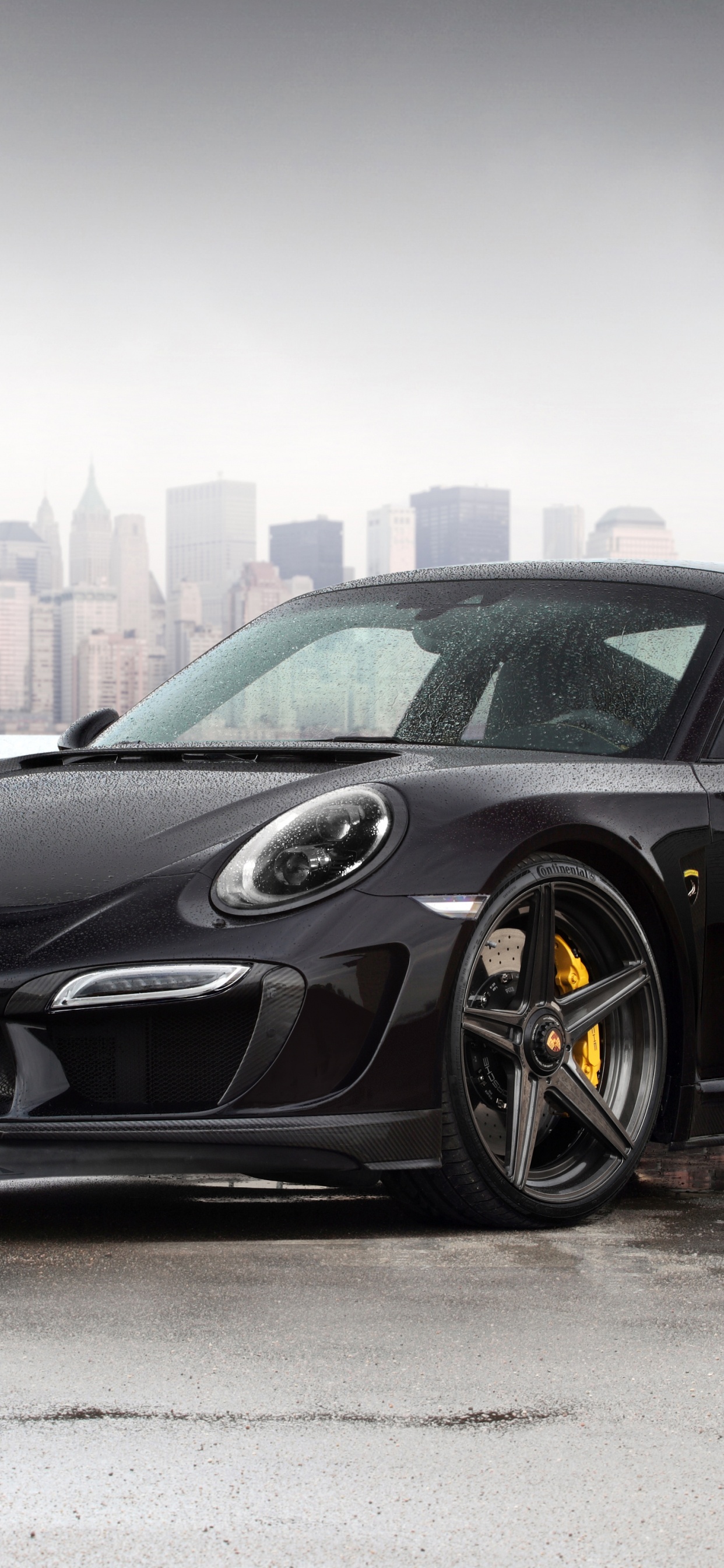 Black Porsche 911 Parked on Gray Pavement During Daytime. Wallpaper in 1242x2688 Resolution