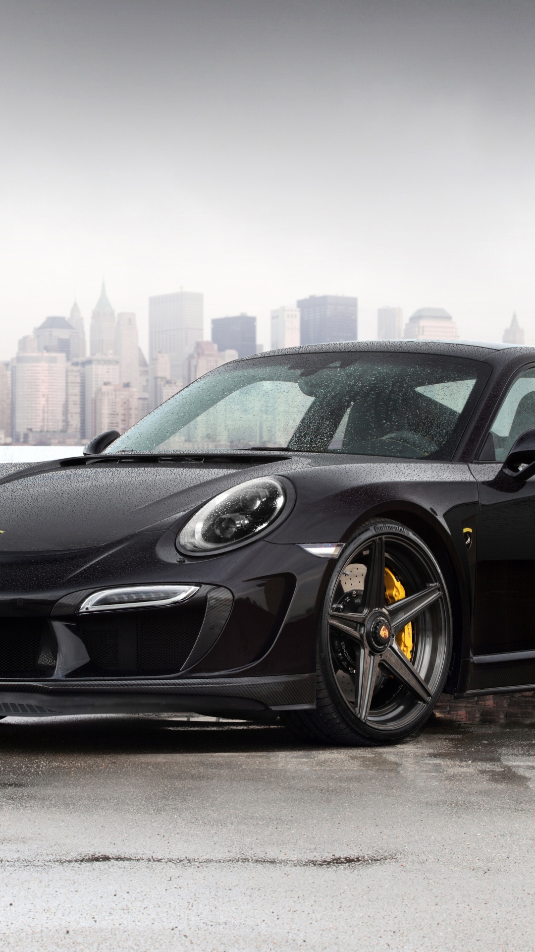 Porsche 911 Negro Estacionado Sobre Pavimento Gris Durante el Día. Wallpaper in 1080x1920 Resolution