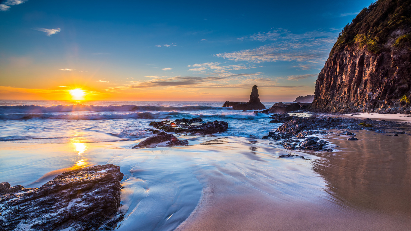 Brown Rock Formation on Sea During Sunset. Wallpaper in 1366x768 Resolution