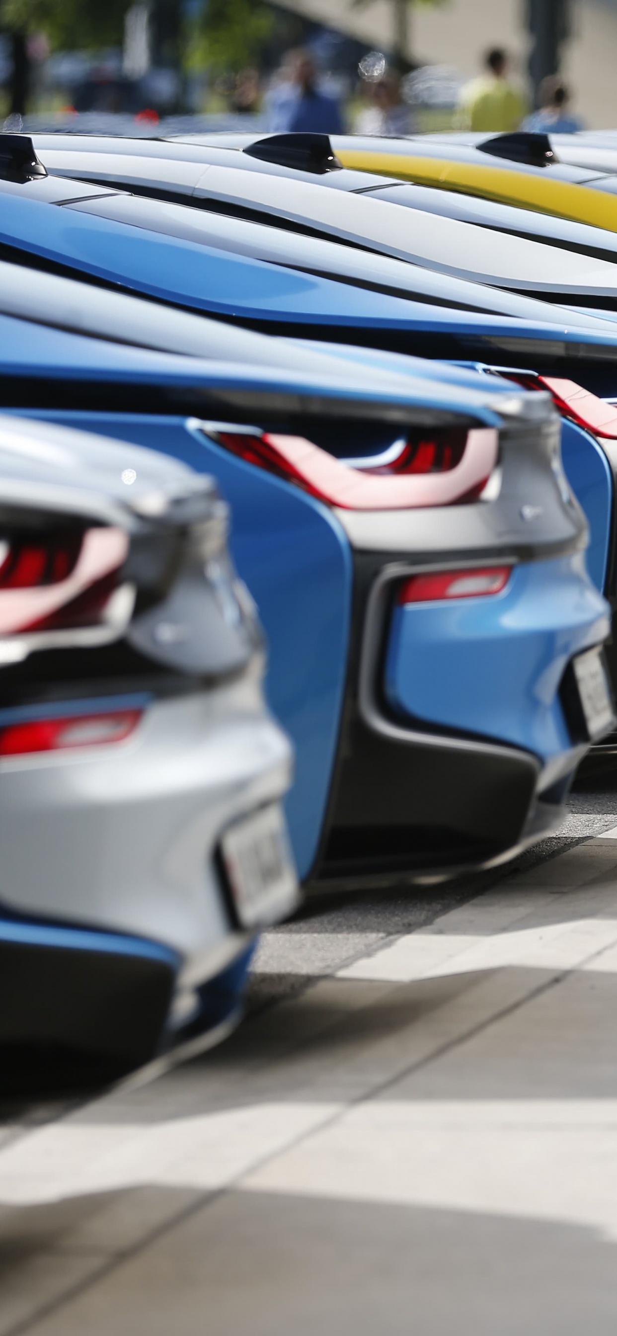 Blue Yellow and Black Cars on Parking Lot During Daytime. Wallpaper in 1242x2688 Resolution
