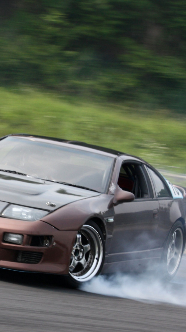 Porsche 911 Noire Sur Route Pendant la Journée. Wallpaper in 750x1334 Resolution