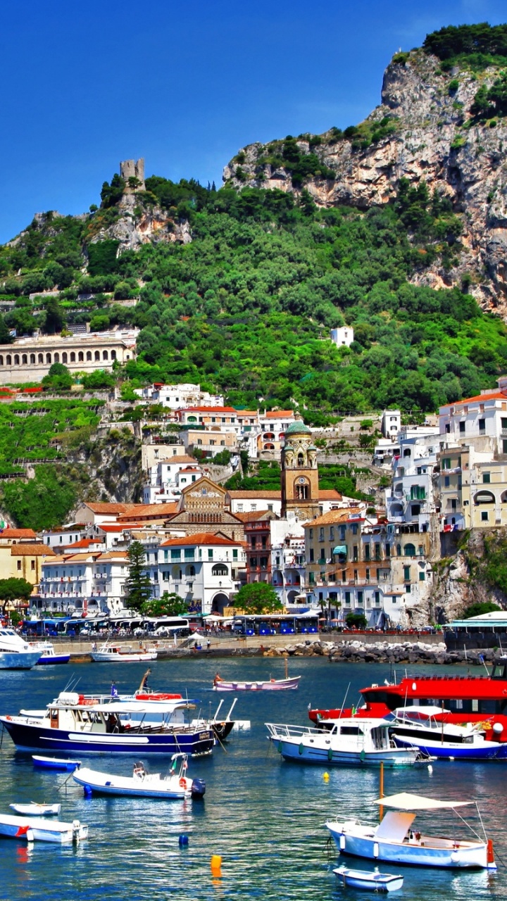 White and Blue Boat on Body of Water Near City Buildings During Daytime. Wallpaper in 720x1280 Resolution