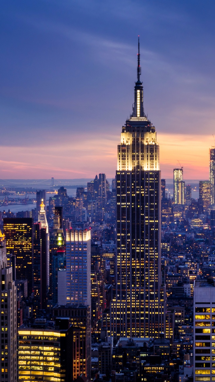 Horizonte de la Ciudad Durante la Noche. Wallpaper in 720x1280 Resolution