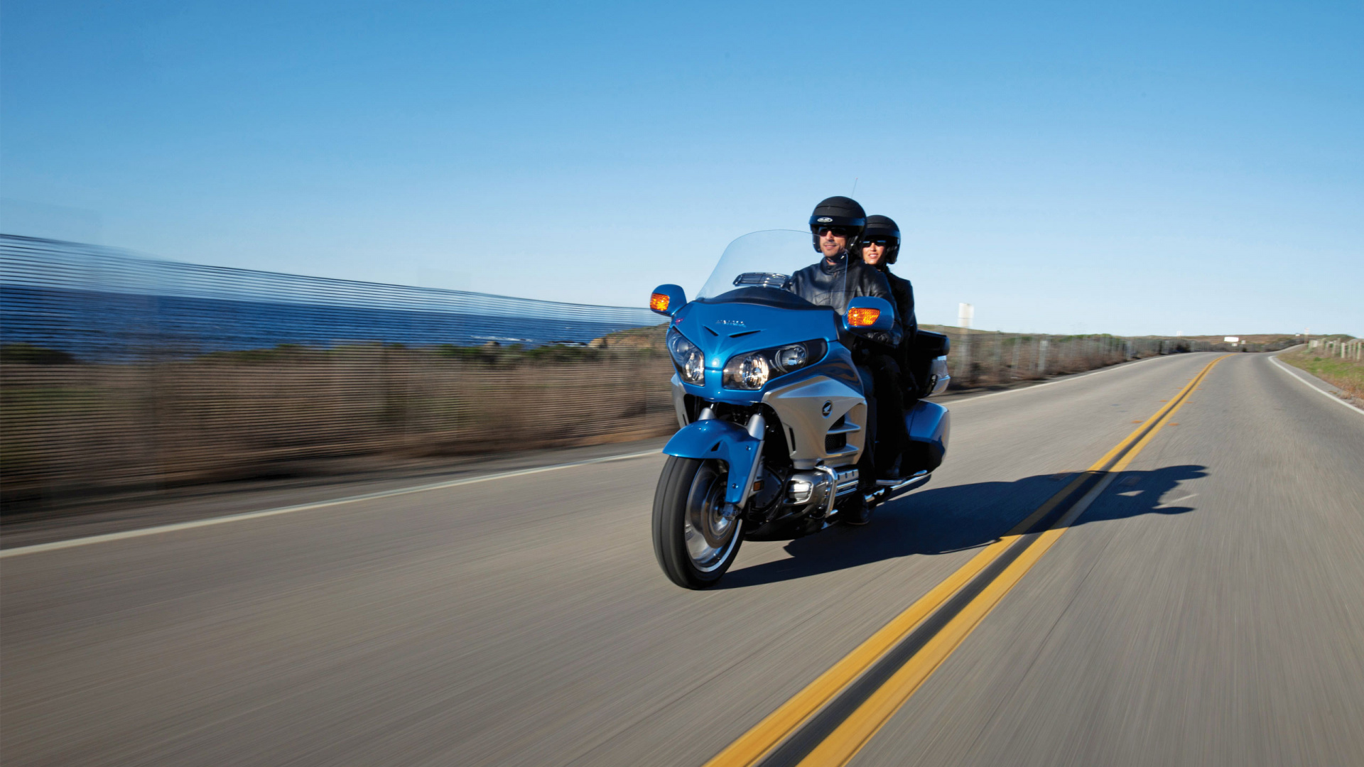 Man in Black Jacket Riding Blue Sports Bike on Gray Asphalt Road During Daytime. Wallpaper in 1920x1080 Resolution