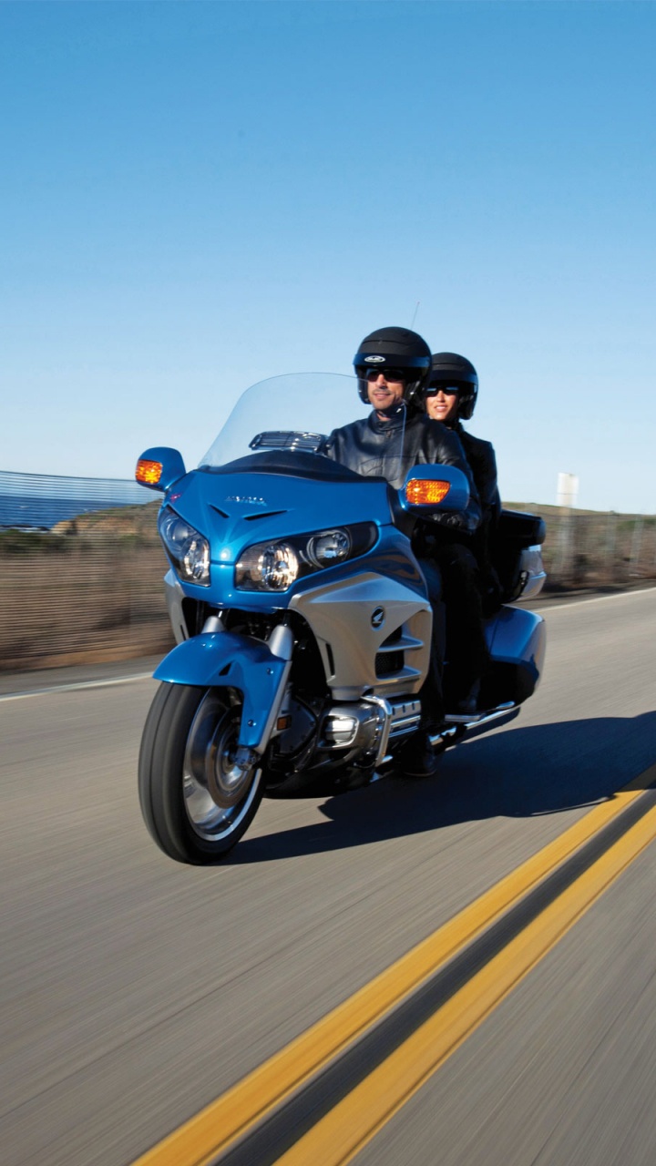 Man in Black Jacket Riding Blue Sports Bike on Gray Asphalt Road During Daytime. Wallpaper in 720x1280 Resolution