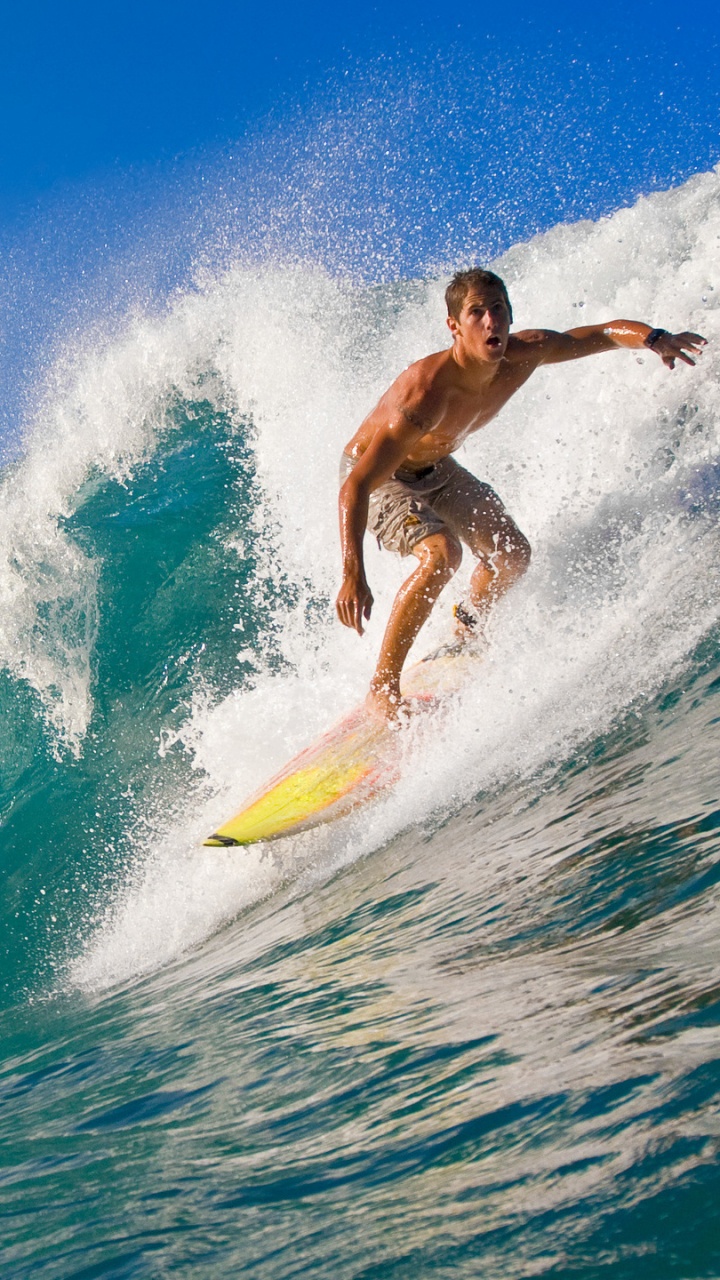 Man Surfing on Blue Sea During Daytime. Wallpaper in 720x1280 Resolution