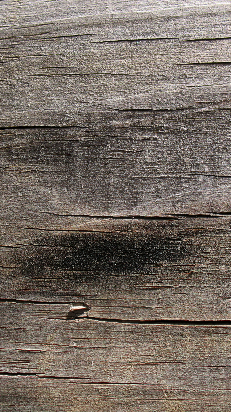 Surface en Bois Marron Avec Des Gouttelettes D'eau. Wallpaper in 750x1334 Resolution