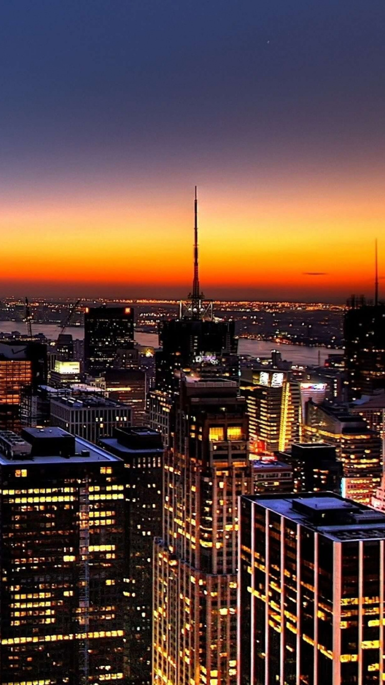 City Skyline During Night Time. Wallpaper in 750x1334 Resolution