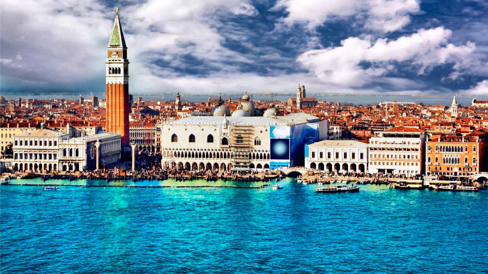 White and Brown Concrete Building Near Body of Water Under Cloudy Sky During Daytime. Wallpaper in 1920x1080 Resolution