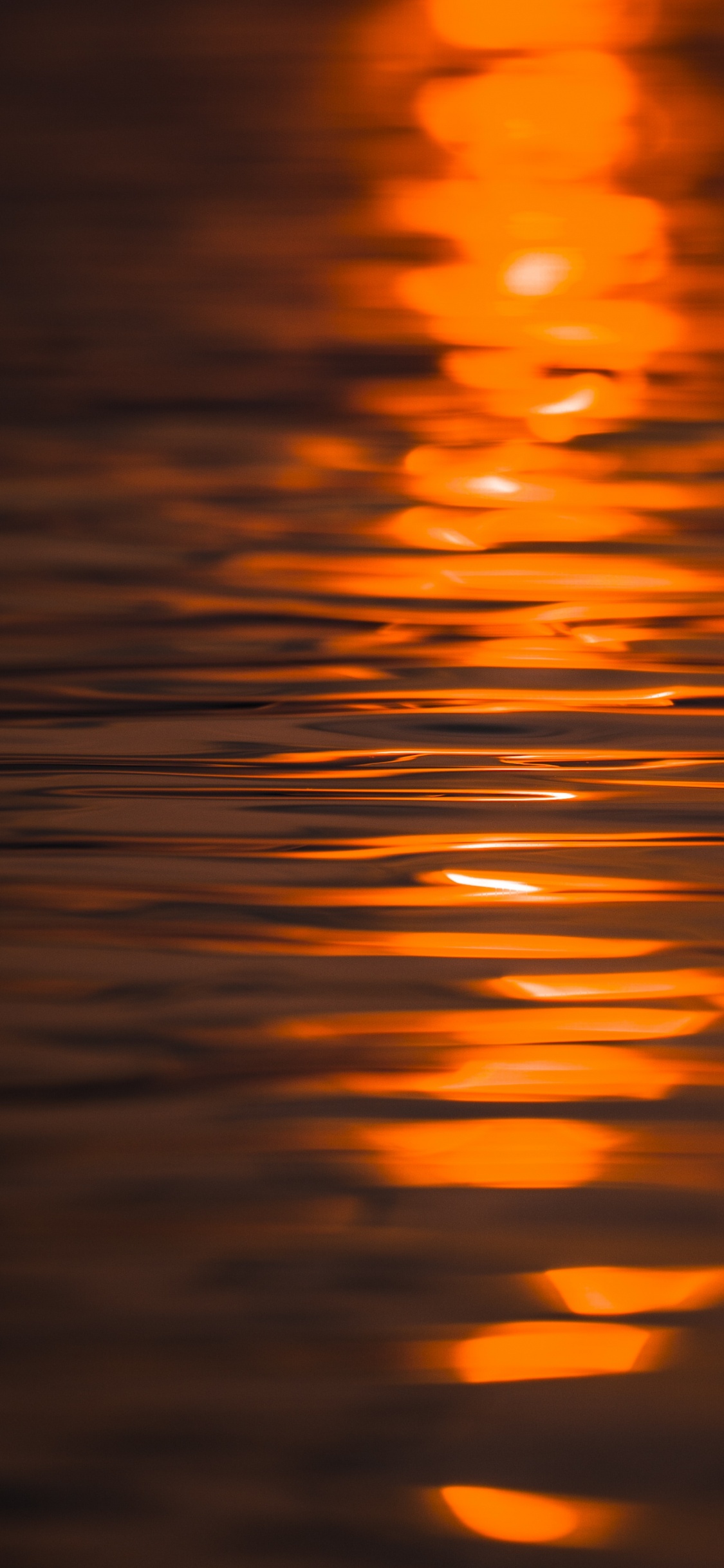 Cuerpo de Agua Durante la Puesta de Sol. Wallpaper in 1125x2436 Resolution