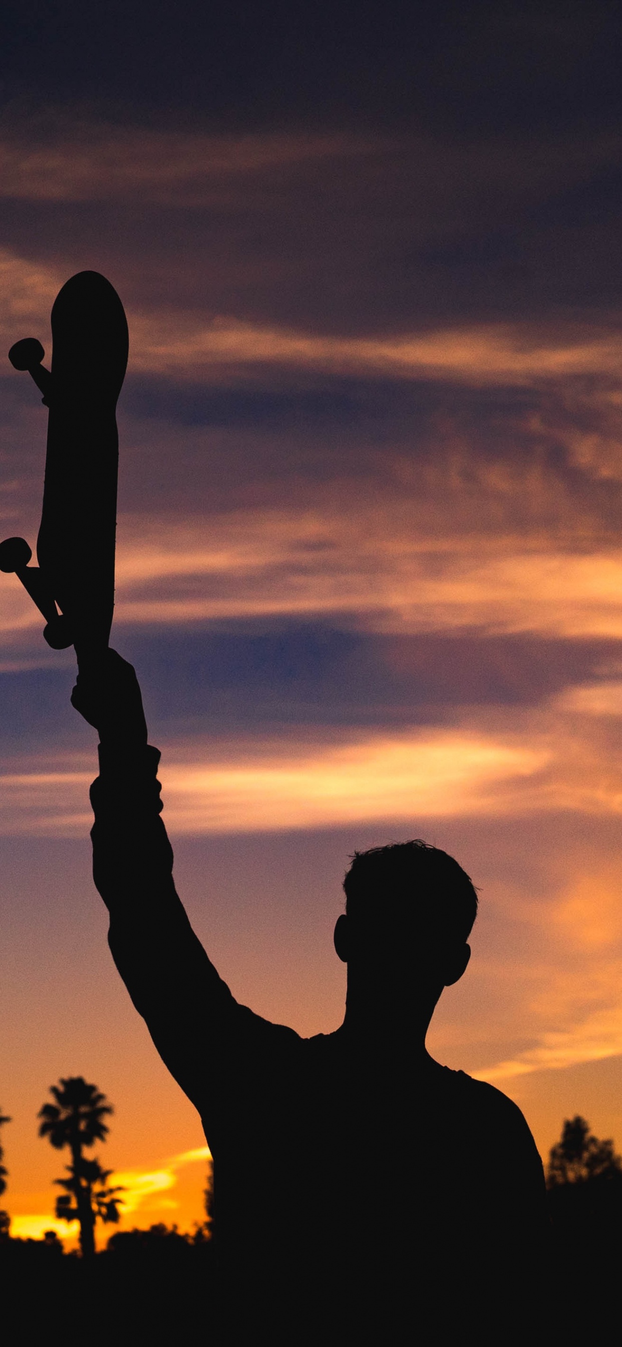 Silhouette D'homme Debout Près Des Arbres Pendant le Coucher du Soleil. Wallpaper in 1242x2688 Resolution